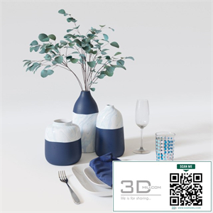 Table setting with eucalyptus branch.