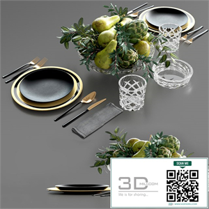 Table setting and fruits in a crystal vase.
